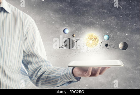 Close up of planet sun system in your hand Stock Photo