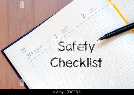 Safety checklist text concept write on notebook with pen Stock Photo