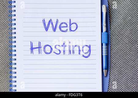 Web hosting text concept write on notebook with pen Stock Photo