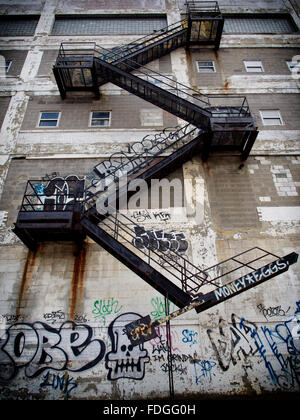 Fire escape outside of Fisher Body, an abandoned factory in Detroit Stock Photo