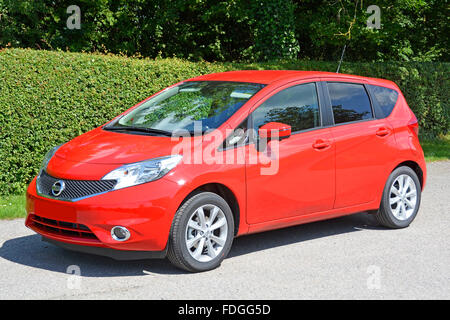 Front & side view Nissan Note Tekna super mini hatchback new car with a 1.2 litre petrol engine tinted glass windows (obscured numberplate) England UK Stock Photo