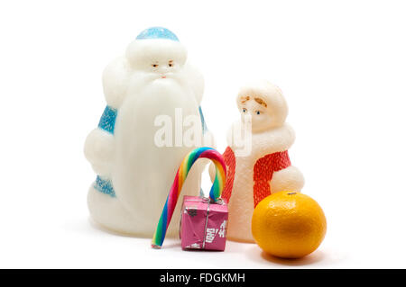 Isolated figures of Ded Moroz and Snegurochka over white Stock Photo