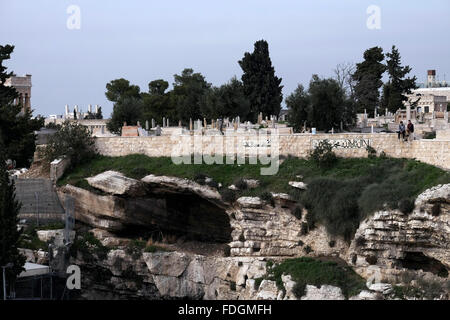 View of the Golgotha hill a rocky escarpment resembling a skull, located , near the rock-cut Garden Tomb or Gordon's Calvary which was unearthed in 1867 and is considered by some Christians especially Evangelical Anglicans and other Protestants to be the site of the burial and resurrection of Jesus Christ . East Jerusalem Israel Stock Photo