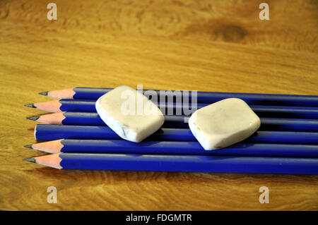 Seven pencils and two erasers Stock Photo