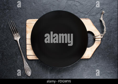 Cutlery setting in the dark colors Stock Photo