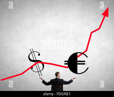 Back view of businessman hold growth arrow graph Stock Photo - Alamy