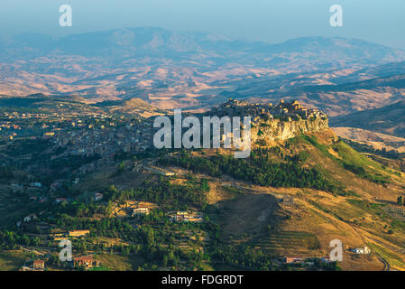 Calascibetta Sicily, aerial view at sunrise of the historic hill-top town of Calascibetta, close neighbour to the city of Enna, Sicily. Stock Photo