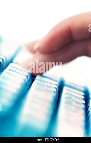 girl hands typing on keyboard macro close up Stock Photo