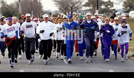 Washington, DC., 6th November,  1993 President William Clinton and Vice President Albert Gore Jr, along with his wife Tipper jog in a 10K race around Haines Point Park.  Credit: Mark Reinstein Stock Photo