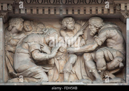 King Solomon and the Queen of Sheba. Marble relief by Italian sculptor Gaspare Vismara on the main facade of the Milan Cathedral Stock Photo