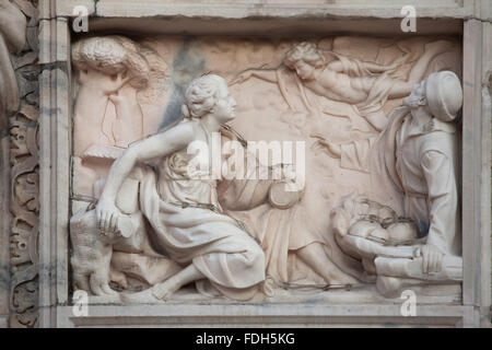 Biblical scene depicted in the marble relief on the main facade of the Milan Cathedral (Duomo di Milano) in Milan, Lombardy, Ita Stock Photo