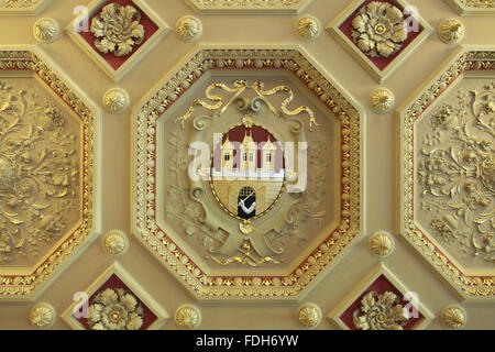 Coat of arms of Prague depicted on the stucco ceiling in the Zofin Palace on Slovansky Island in Prague, Czech Republic. Stock Photo