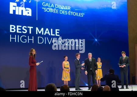 Budapest, Hungary. 31st Jan, 2016. Britain's Gary Hunt (3rd L) receives the trophy for the best male high diver from Pal Schmidt (3rd R), honorary president of the Hungarian Olympic Committee, during the 2015 FINA World Aquatics Gala, or the FINA Best Athletes of the Year of 2015 awarding ceremony, in Budapest, Hungary, Jan. 31, 2016. FINA named Gary Hunt the best male high diver of the year 2015. Credit:  Attila Volgyi/Xinhua/Alamy Live News Stock Photo