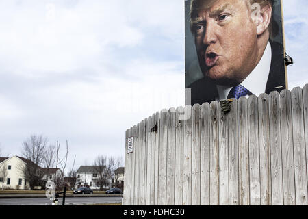 West Des Moines, Iowa, USA. 31st Jan, 2016. A poster of Donald Trump outside the home of George Davey, a Trump supporter who said he will be caucusing for him on Feb. 1. The poster is 2 meters by 1 meter, and will probably be kept up for the entire 2016 US Presidential election. The poster has been vandalized but can be cleaned easily. © Bill Putnam/ZUMA Wire/Alamy Live News Stock Photo