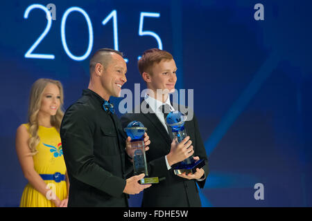Budapest, Hungary. 31st Jan, 2016. Bill May (L) of the United States and Alexandr Maltsev of Russia pose after receiving their trophies during the 2015 FINA World Aquatics Gala, or the FINA Best Athletes of the Year of 2015 awarding ceremony, in Budapest, Hungary, Jan. 31, 2016. Bill May and Alexandr Maltsev shared the honors as best male synchronized swimmers of the Year 2015. Credit:  Attila Volgyi/Xinhua/Alamy Live News Stock Photo