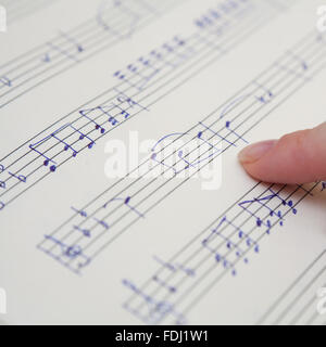 Music book with handwritten notes Stock Photo