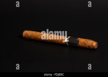 Cuban cigar on black background Stock Photo