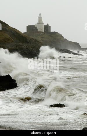 Swansea, Wales, UK. 1st February, 2016. Huge waves lash the coast near Swansea, overlooking Mumbles lighthouse, as Storm Henry hits. Credit: Andrew Bartlett/Alamy Live News. Stock Photo
