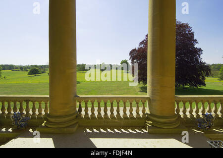 View from the recessed Ionic portico over the lawn to the West front at  Basildon Park, built 1776-83 by John Carr for Francis Sykes, at Lower Basildon, Reading, Berkshire. Stock Photo