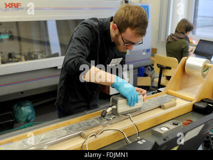 Bremen, Germany. 01st Feb, 2016. Marine scientist Laurence Philpott prepares the scan of a drill core sample from the bottom of the Atlantic Ocean in a laboratory of the MARUM of the University of Bremen in Bremen, Germany, 01 February 2016. The sample was retrieved from the Mid-Atlantic Ridge during an international expedition of scientists. Photo: Ingo Wagner/dpa/Alamy Live News Stock Photo