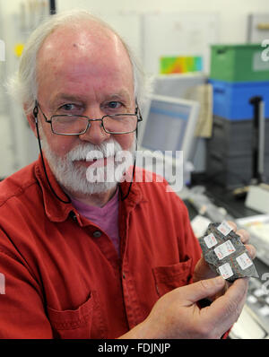 Bremen, Germany. 01st Feb, 2016. Marine scientist Walter Hale shows a marked drill core sample from the bottom of the Atlantic Ocean in a laboratory of the MARUM of the University of Bremen in Bremen, Germany, 01 February 2016. The sample was retrieved from the Mid-Atlantic Ridge during an international expedition of scientists. Photo: Ingo Wagner/dpa/Alamy Live News Stock Photo
