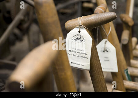 Wooden-handled spades and shovels at Patterson's Spade Mill, Co. Antrim, Northern Ireland. The mill in Templepatrick is the last working water-driven spade mill in daily use in the British Isles. Stock Photo