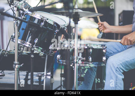 Close-up of a man playing drums Stock Photo