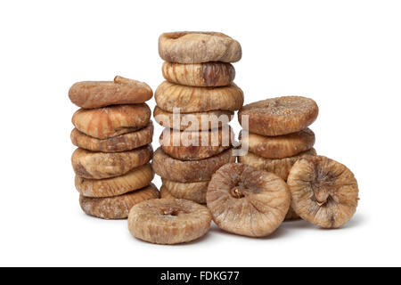 Dried figs in rows on white background Stock Photo