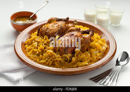 Couscous Tfaya, Moroccan Couscous with chicken and caramelized Onions, almonds Stock Photo
