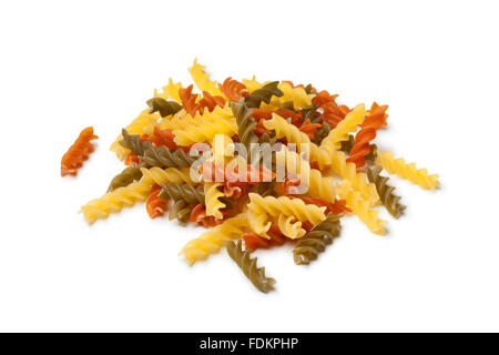 Raw fusilli pasta on white background Stock Photo