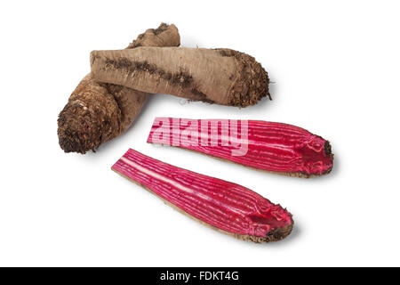 Organic heirloom whole and half beets on white background Stock Photo