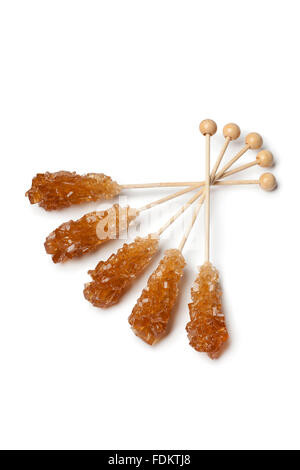 Brown Rock candy sticks on white background Stock Photo