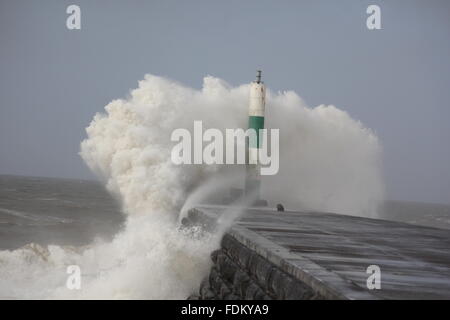 Aberystwyth Wales UK, 2016, huge waves driven by gale force winds continue to batter the sea defences  of the Welsh coast Stock Photo