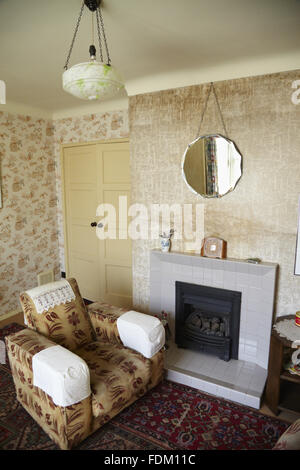 Living Room With Fireplace In A 1950 S Bungalow Stock Photo