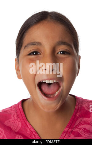 Young teenage girl screaming loud on white background Stock Photo