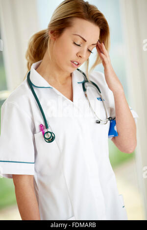 Female nurse giving head massage to woman Stock Photo: 105267498 - Alamy