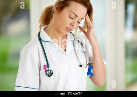 Tired nurse Stock Photo