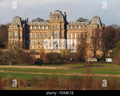 View of the Bowes Museum in Barnard Castle, Teesdale, County Durham, from the far side of the River Tees. Stock Photo