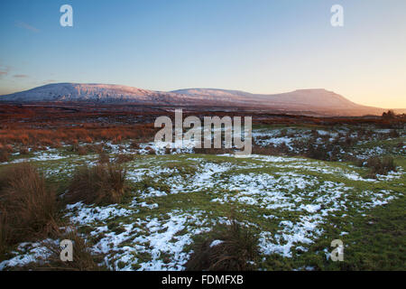 Park Fell Simon Fell and Ingleborough at Sunset in Winter Ribblehead Yorkshire Dales England Stock Photo