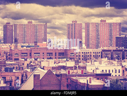 Vintage toned photo of New York residential buildings in rainy day, Harlem, USA. Stock Photo