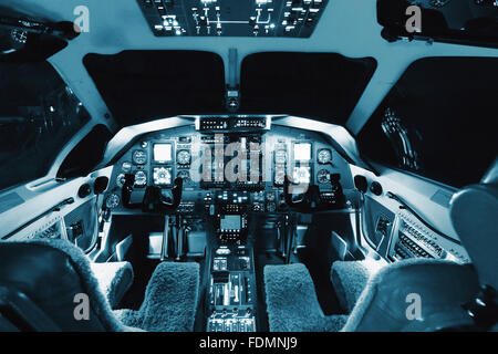 Aircraft interior, cockpit view inside turboprop plane. Stock Photo