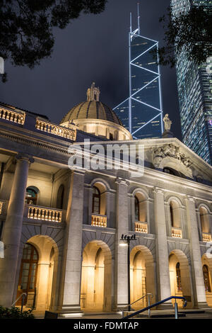 Court of Final Appeal Building (or Legislative Council or Supreme Court) and skyscrapers in Central Hong Kong, China, at night.
