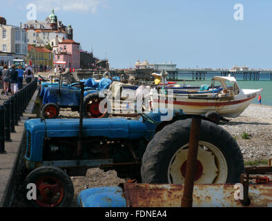 Fishermen's tractors on the beach at Cromer Stock Photo