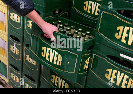 Stack of Jever beer crates in a wholesale. Stock Photo