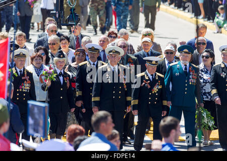 SEVASTOPOL, CRIMEA - MAY 9, 2015: Veterans at the parade in honor of the 70th anniversary of Victory Day on 9 May 2015, Sevastop Stock Photo