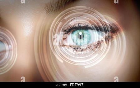 Eye viewing digital information represented by circles and signs Stock Photo