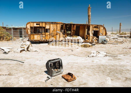 An abandoned camping trailer on the western shore of the Salton Sea, California Stock Photo