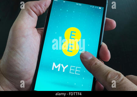 EE mobile phone app on an iPhone 6 Plus smart phone Stock Photo