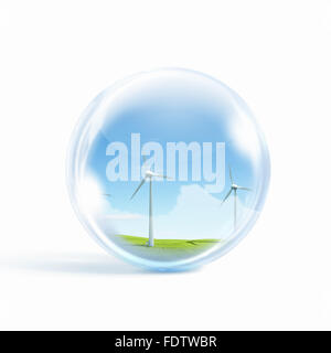 A group of wind turbines or windmills inside a glass sphere Stock Photo