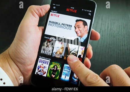 Homepage of Netflix on-demand Movie and TV streaming service app on iPhone 6 plus smart phone Stock Photo